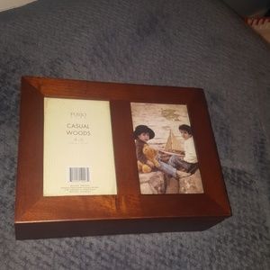 Storage container with picture frames on the front